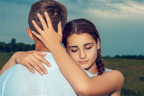 Beautiful Young Girl Hugging A Guy In Nature Stock Image Image Of