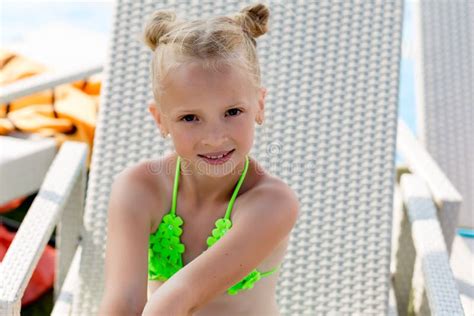 Young Girl In A Swimsuit On A Shelf By The Pool Stock Image Image Of Fashion Beach 111974731