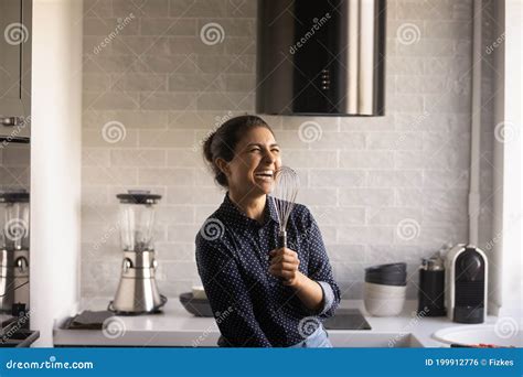 Happy Indian Woman Have Fun Cooking At Home Kitchen Stock Photo Image