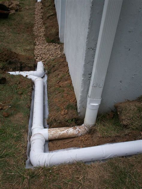 Installation In Progress Downspout Extension Connected To French Drain