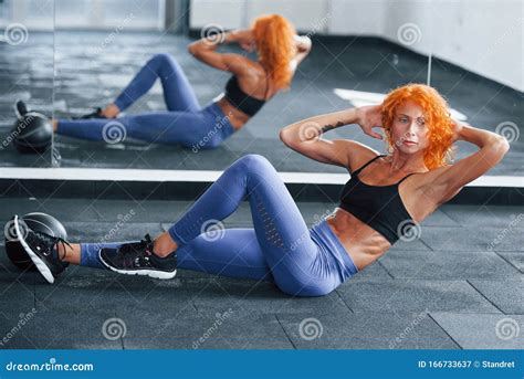 Doing Abs Sporty Redhead Girl Have Fitness Day In Gym At Daytime Stock Image Image Of