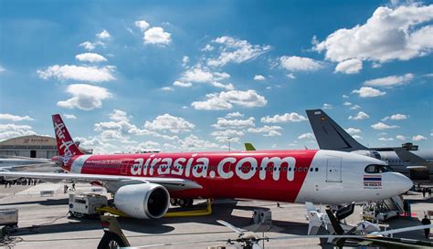 Airasia and malindo air have their own skills to attract and managed their customer. AirAsia unveils new Airbus A330neo at Paris Air Show ...