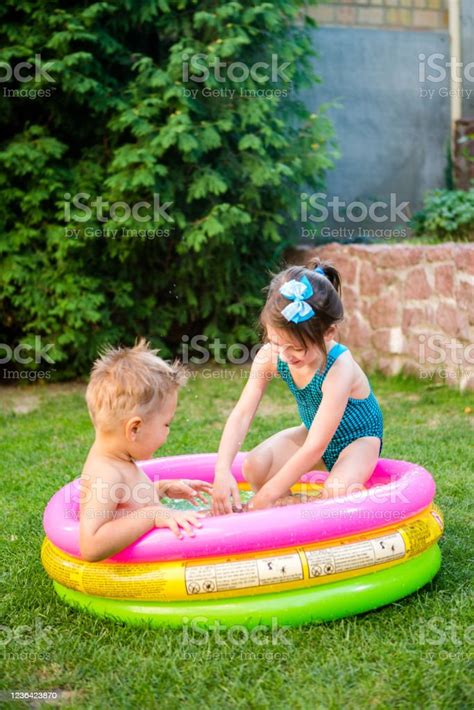 Kids Having Fun Party Swimming In Back Yard Pool Funny Children Bathing
