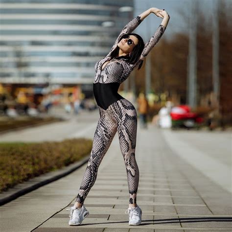 Gxqil Sexy Gym Woman Sportswear 2019 Unique Bodycon Long Sleeve Bodysuit Fitness Yoga Clothes