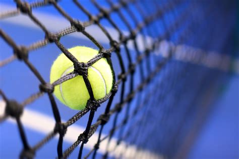 Tennis Ball On A Tennis Court VistaProduction