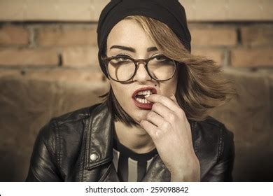Sexy Lady Biting Her Finger Seductively Stock Photo