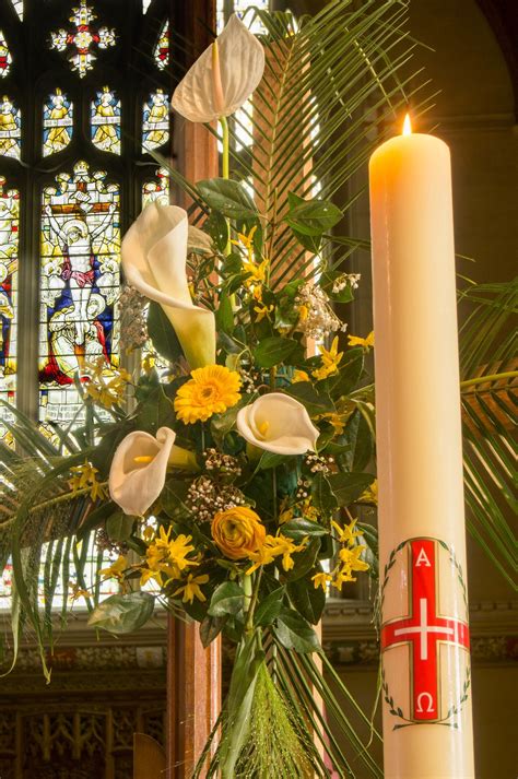 Easter Flowers And Paschal Candle Easter Church Flowers Easter
