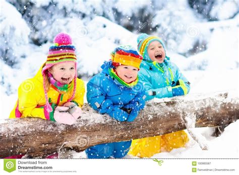 Kids Playing With Wooden Train Set Royalty Free Stock Photo
