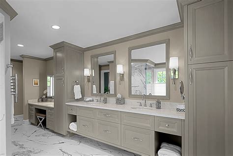 Linen slab drawer front contributes to the sleek, minimal look. Large master bathroom has gray stained custom vanity with ...