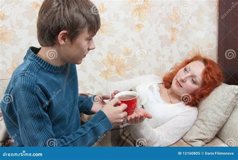 Son Giving His Mother Tea Royalty Free Stock Photo Image 12160805