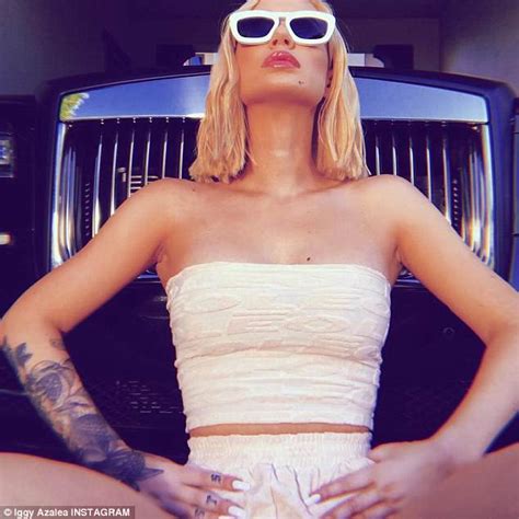 Iggy Azalea Shows Off Ample Derriere In Front Of Rolls Royce Daily