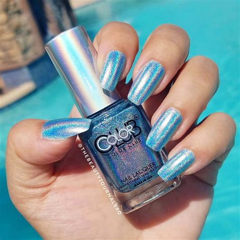 shimmering blue holographic nails