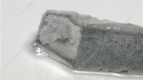 Pure potassium metal will float on water. Cutting potassium metal - Stock Video Clip - K001/3553 ...