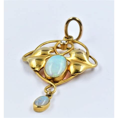 Art Nouveau 9ct Gold Pendant Set With Two Opals And A Seed Pearl