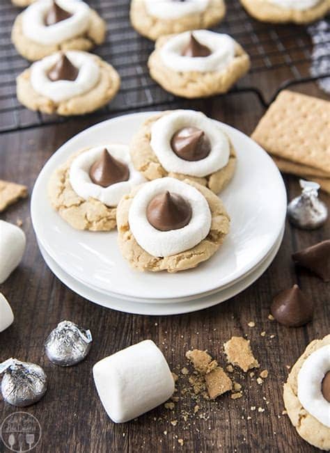 Tender peanut butter cookies, made from scratch in a recipe that comes together quickly, are the base that sets the standard. Hershey Kiss S'mores Cookies - Like Mother, Like Daughter