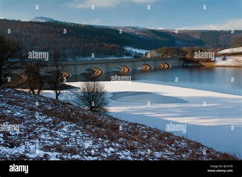 A Frozen Ladybower Reservoir In The Peak District With Ashopton Viaduct