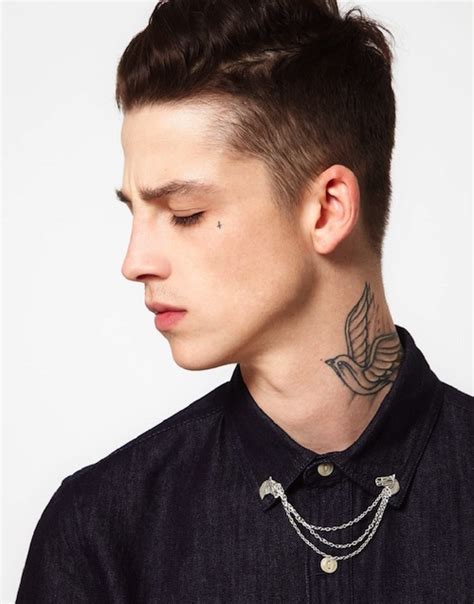 Neck tattoos are highly noticeable. Neck Tattoo: Bold Choice or Big Pain? - Tattoo.com