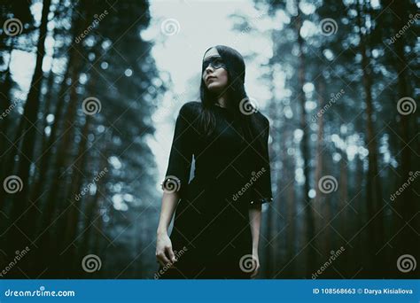 Portrait Of A Beautiful Mysterious Woman In The Forest Cold Ton Stock