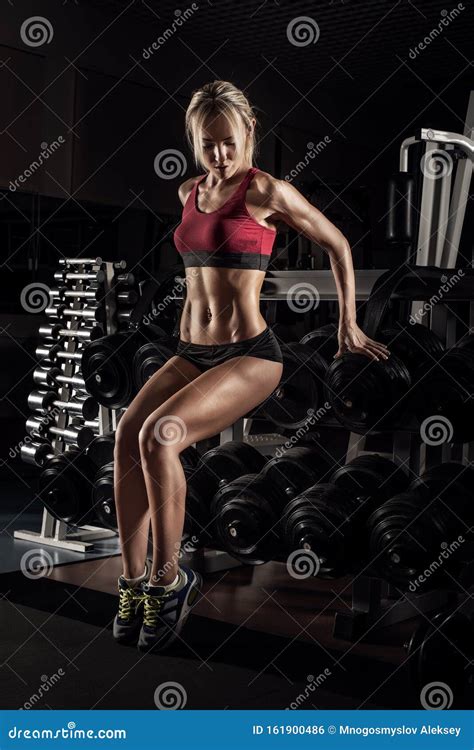 Beautiful Woman Bodybuilder In Gym Stock Photo Image Of Heavy