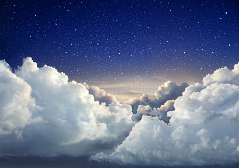 Beautiful Starry Night Sky Background With Large Clouds Stock Photo