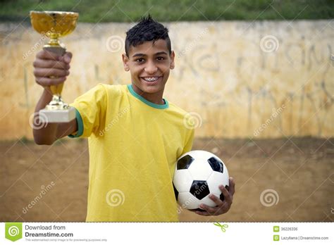 Young Brazilian Football Soccer Player Holding Trophy Stock Photo