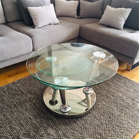 Free coffee table dimensions 64l x 42w x 30h. Buy Round Glass Moving Coffee Table Online | Julia Jones