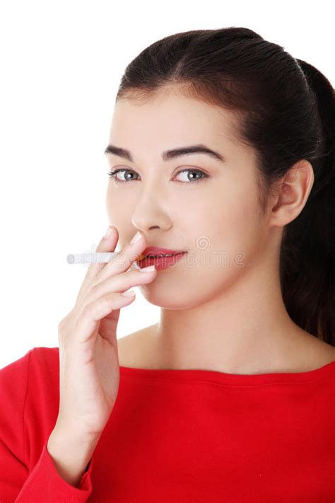 Young Woman Smoking Electronic Cigarette Royalty Free