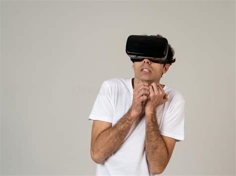 Young Man Having A Scary Experience With Virtual Reality Goggles