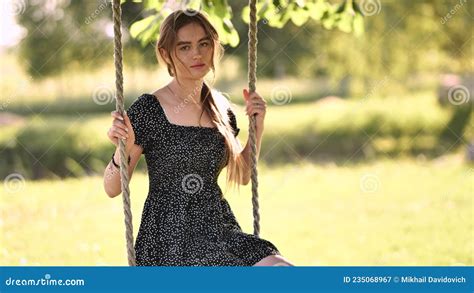 Young Beautiful Long Haired Girl On A Rope Swing Stock Image Image