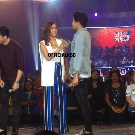 this is the handsome daniel padilla and the pretty kathryn bernardo smiling for the camera and