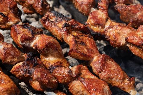 Grilled Pork Shish Kebab Cooking On Skewers On Charcoal Grill Stock