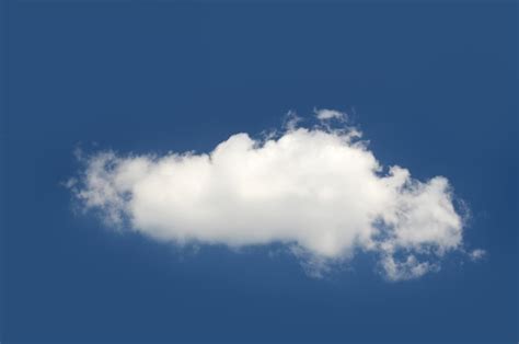 Premium Photo Single Cloud Isolated Over Blue Sky Background