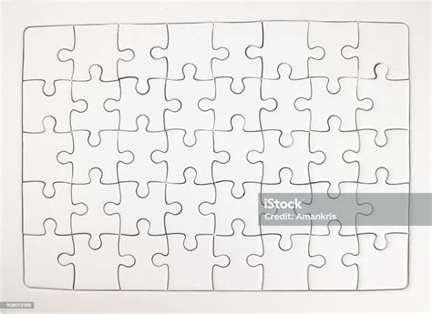 White Jigsaw Puzzle Pieces Completed As Copy Space Stock Photo