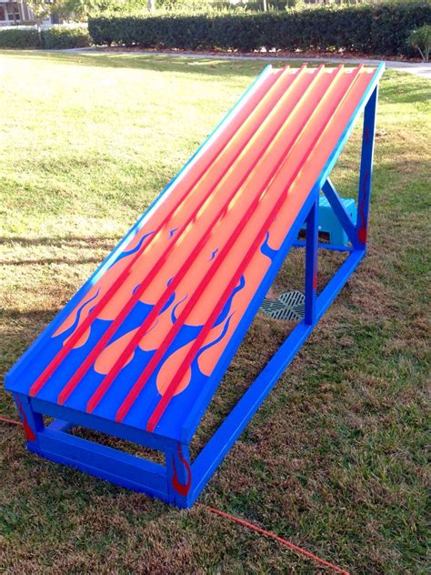 This part is for the hot wheels track builder sets. Hubby made this race track for my son's Hot Wheels Birthday party #diy #hotwheels | Hot wheels ...