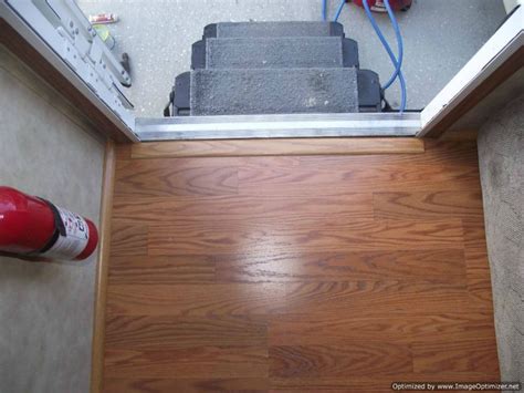 The threshold piece is plastic so i don't know if i can nail quarter round to. Door Transition & ://.nahfloors.com/wp-content/upl ...