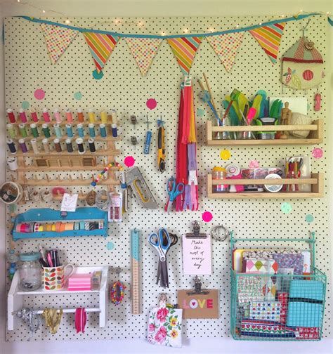 This is an organizer's dream come true… so many places to put things! mousehouse: Craft Room Pegboard DIY