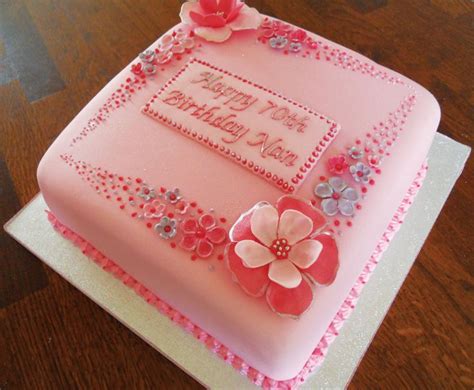 Complete with crystals and rhinestones, the tiara can also be used as a cake topper for the big reveal. Pink Flowery 70th Birthday Cake | Cool birthday cakes ...