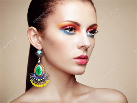 Portrait Of Beautiful Young Woman With Earring Jewelry And Acce