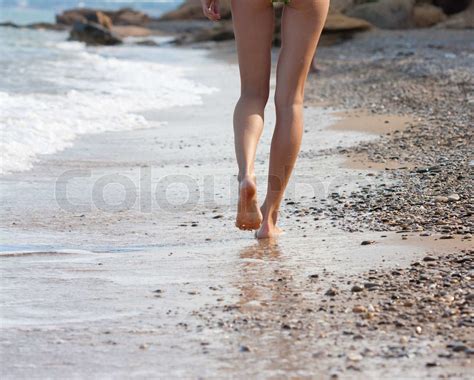 Woman Walking On The Sand Beach Stock Image Colourbox