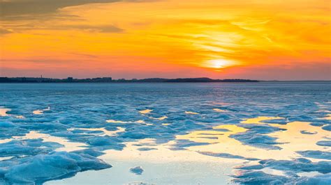 Frozen Ice Water Under Yellowo Sky During Sunrise 4k Nature Hd Desktop