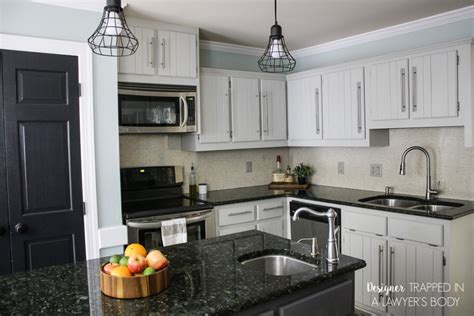 Light blue beadboard backsplash is ideal for a seaside kitchen. 12 Gorgeous and Bright Light Gray Kitchens | Table and Hearth