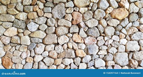 Colorful Stone Or Rock Wall For Background Or Wallpaper Stock Photo