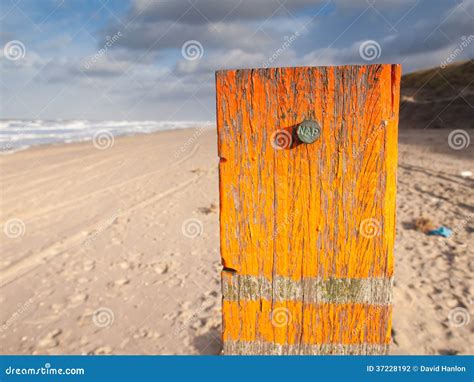 Beach Post With Sea Level Marker Stock Photo Image Of Ordnance