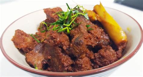 This dish is perfect to warm those tummy's on cold winter nights. Nyonya Style Slow-Cooked Beef Rendang Recipe - Butterkicap