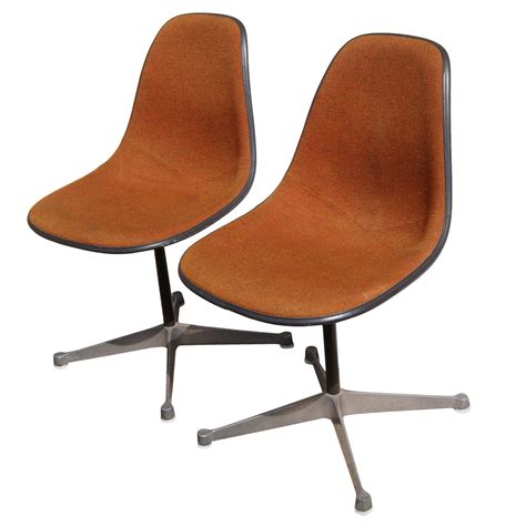 Charles and ray created this design in response to demands for a lightweight stacking chair that could be set up quickly for large groups and, at the same time, be stored with ease. (2) Vintage Herman Miller Eames Upholstered Fiberglass ...