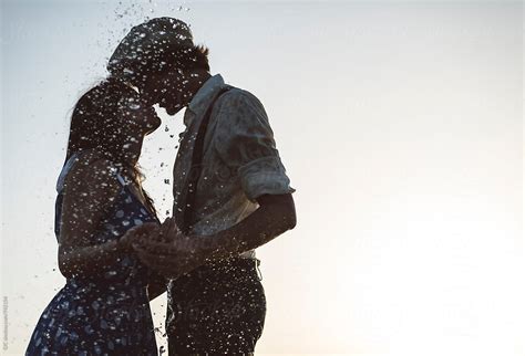 Young Couple Vintage Dressed Having Fun On The Beach By Simone Wave