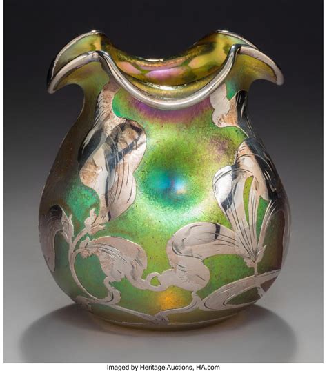 An Austrian Iridescent Glass Dimpled Vase With La Pierre Silver Overlay Circa 1 Iridescent