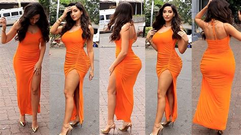 Uff निकल कर बहार आ गए 🍑 Nora Fatehi Flaunts Her Body In Orange Silky Outfit At Filmycity Youtube