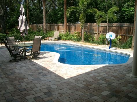 If you wish to utilize the small space for different purposes and functions like entertainment or play area, this is still possible as long as you organize them in separate areas so you create spaces in between. Backyard | Backyard pool landscaping, Pool landscape ...