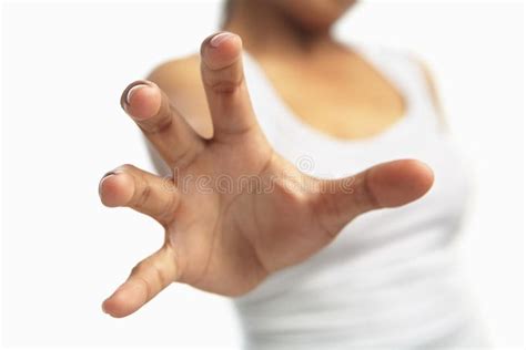 Woman Hand Trying To Reach Out To Camera Isolated And Selective Focus